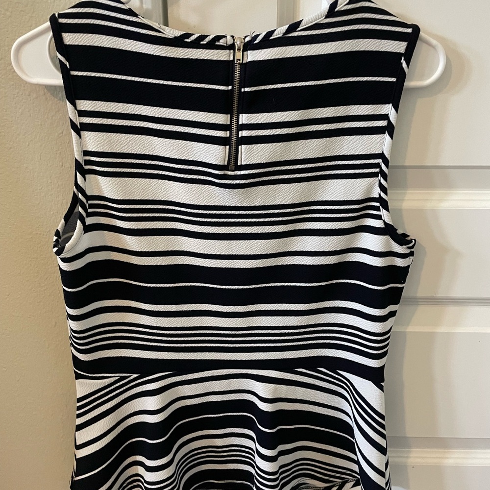 Casual couture peplum top size medium